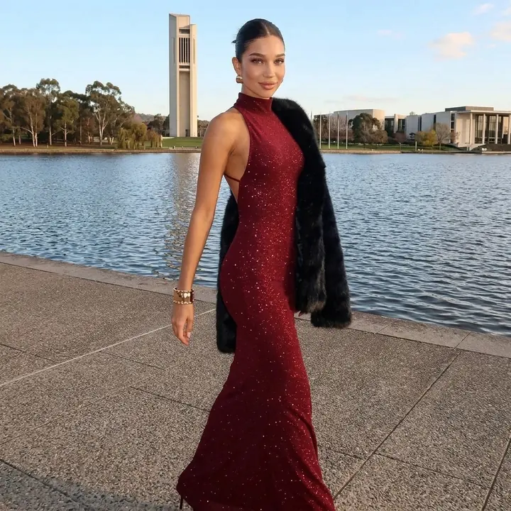 Burgundy sequin halter maxi dress on model, AI product photo