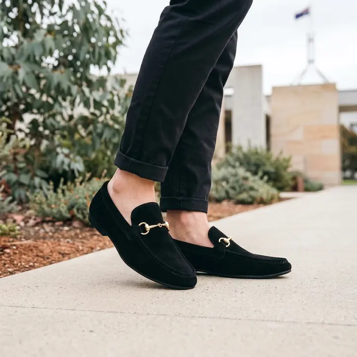 Black suede men's loafer with horsebit, AI product photo