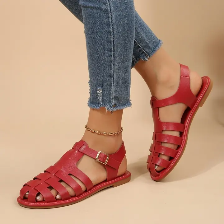 Red fisherman sandals on foot, AI product photo
